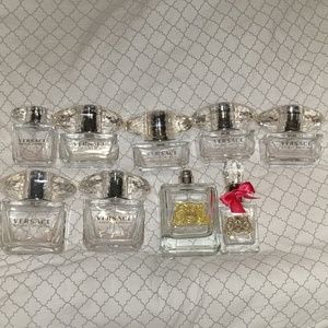 Empty Versace and Viva la Juicy Perfume Bottles